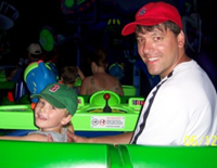 tommy & mike on ride #3 of buzz lightyear's space ranger spin