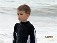 Nicholas in the surf.